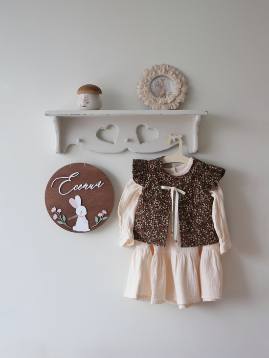 Стеганный жилет с крылышками