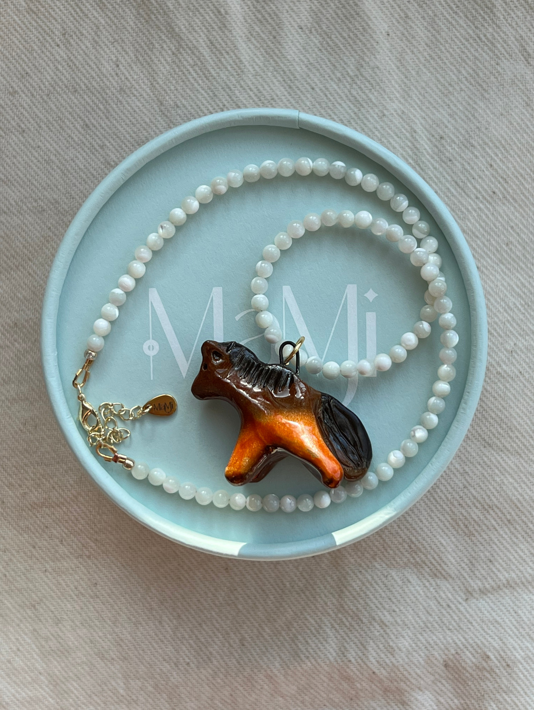 Колье «Лошадка» с керамической подвеской - фотография товара