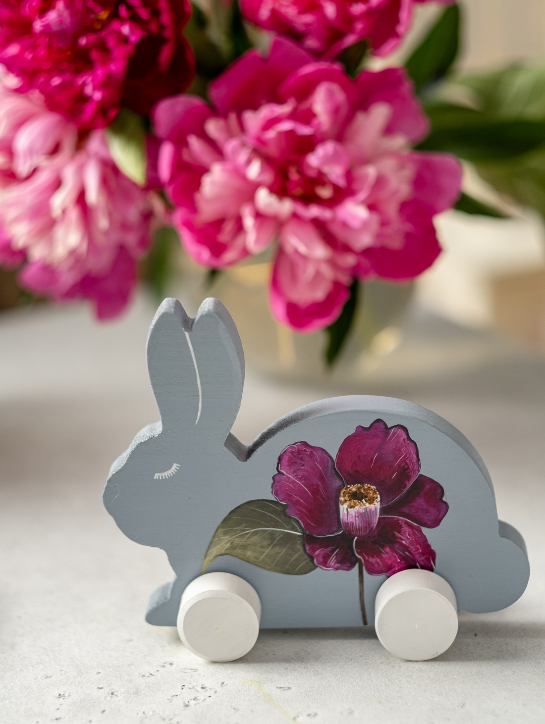 Игрушка-каталка "Зайка" - фотография товара