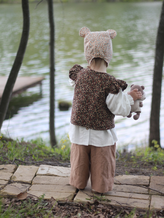 Стеганный жилет с крылышками